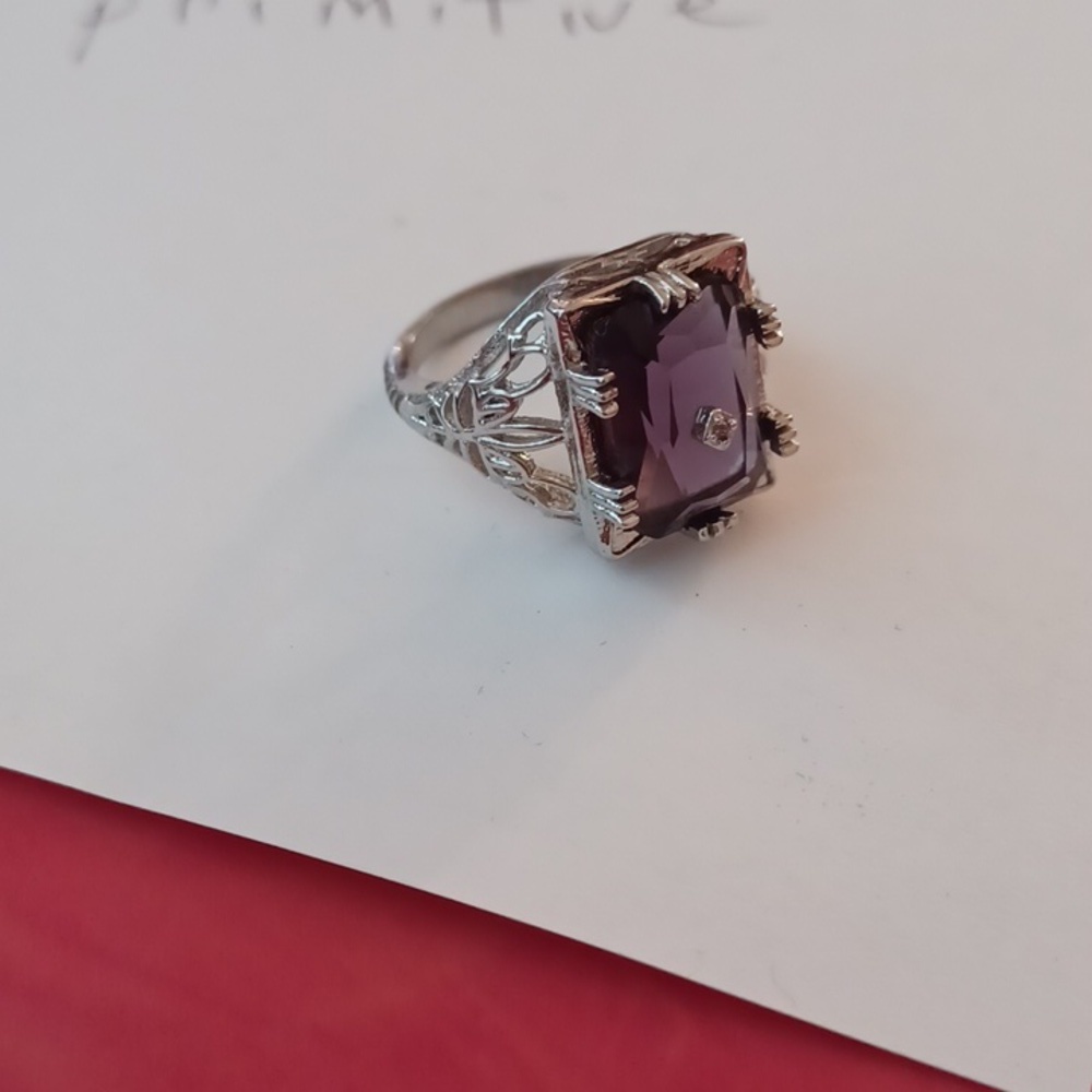 Silver ring marked s925 size 6 purple  stone